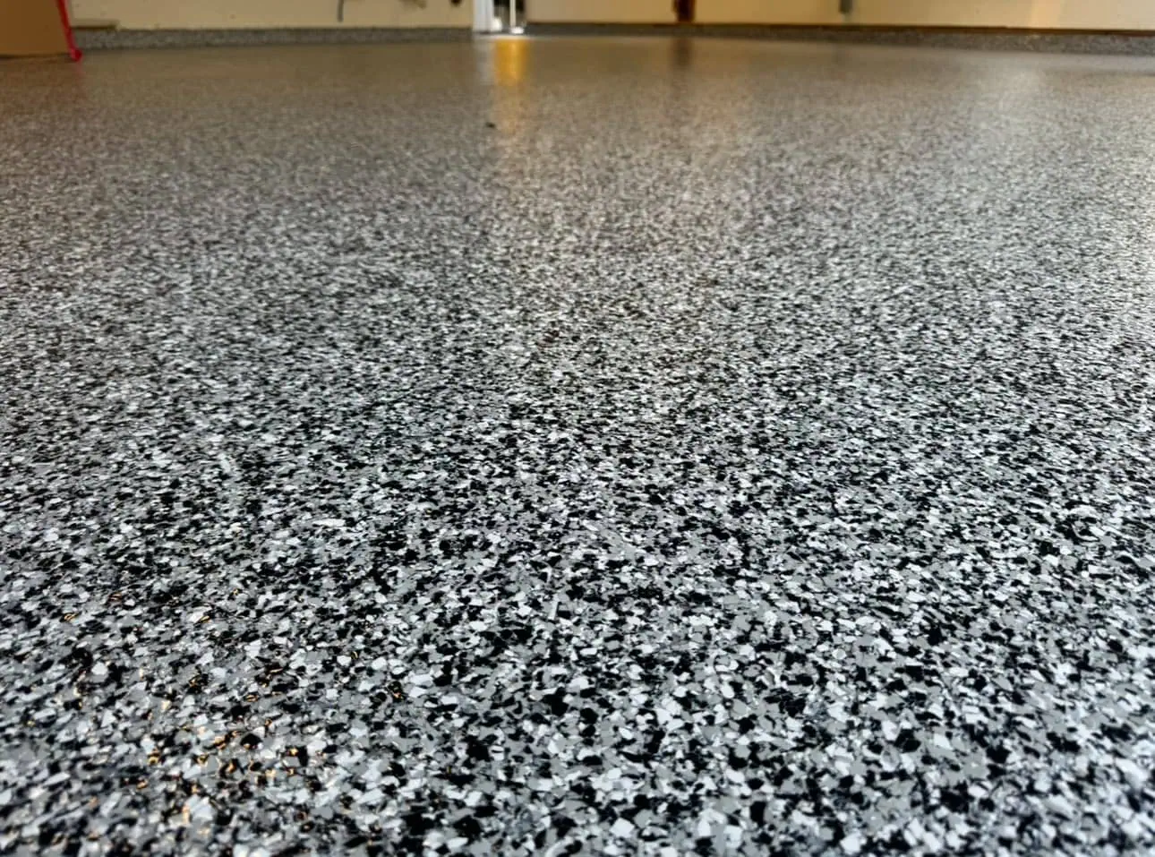 T&T Concrete Coatings professional basement floor coating installation in Crown Point, IN